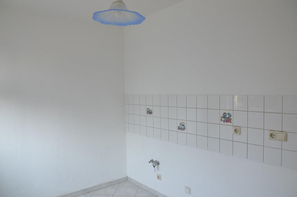 Küche mit Fliesenspiegel